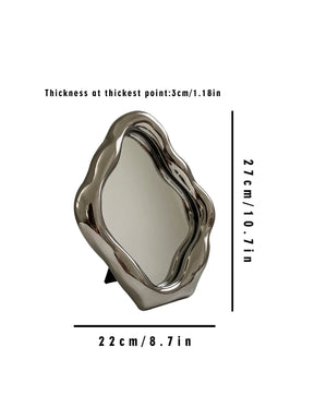 Oregelbunden vintage byråspegel